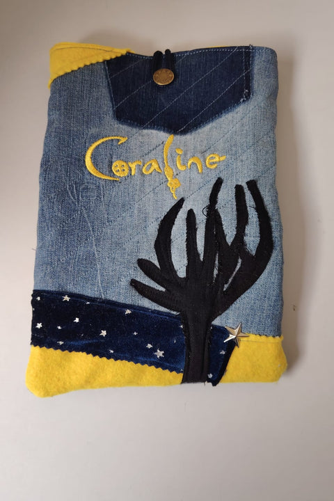 Funda de tela para libros Coraline